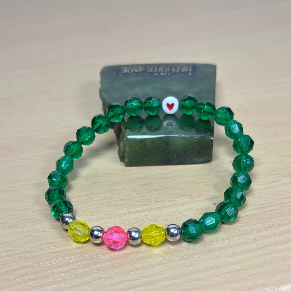 Green Beaded Stretch Bracelet with Pink & Yellow Accents by